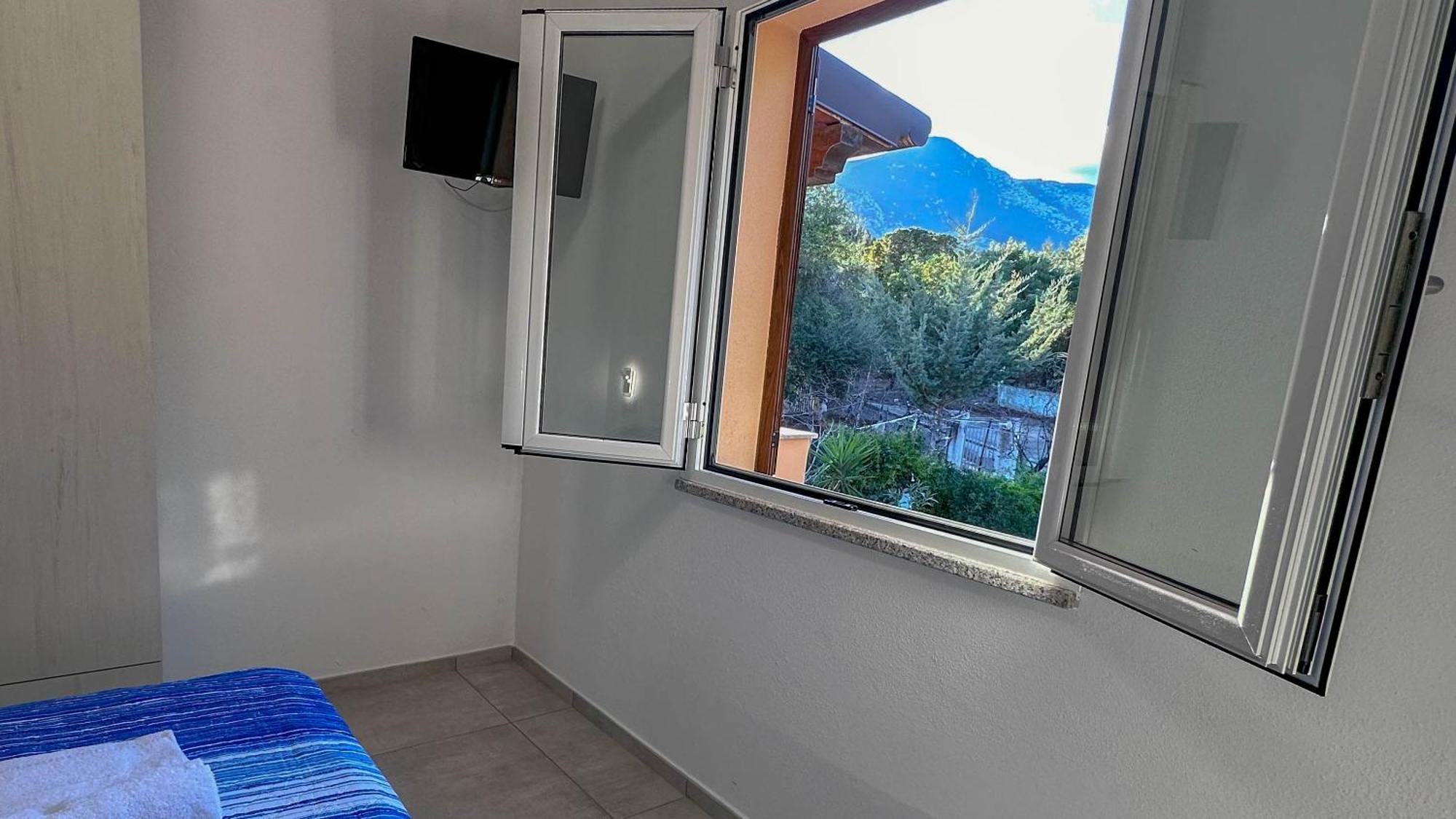 Апартаменты Mama House Con Vista Mare Кала-Гононе Экстерьер фото